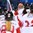 GANGNEUNG, SOUTH KOREA - FEBRUARY 14: Switzerland's Livia Altmann #22, Isabel Waidacher #24 and Lisa Ruedi #12 skate out to celebrate with Florence Schelling #41 after a 2-1 win over Team Sweden during preliminary round action at the PyeongChang 2018 Olympic Winter Games. (Photo by Matt Zambonin/HHOF-IIHF Images)

